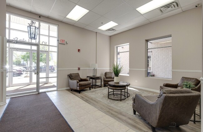 Bright secure lobby sitting area - 10 N Lake St