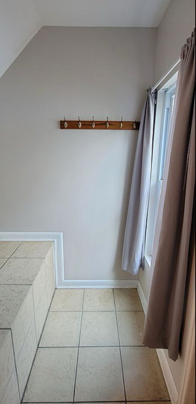 Small shoe storage at entrance - 15 Minden Ave