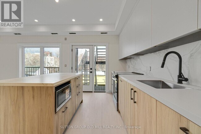 Building Photo - 625 Harvie Ave