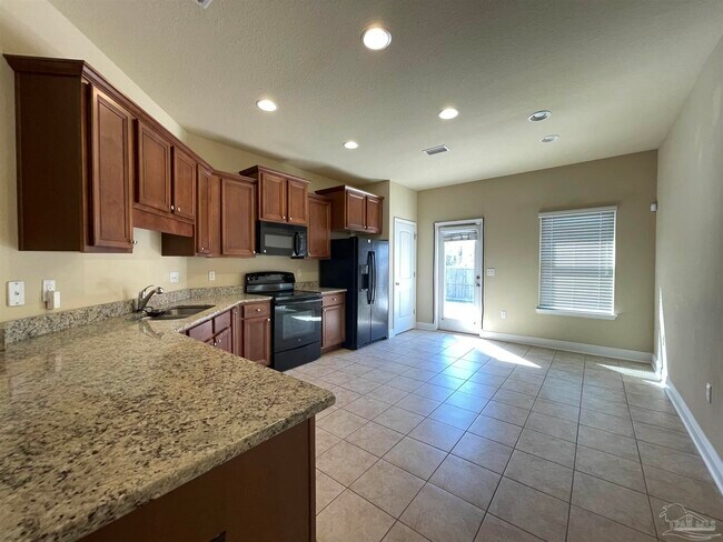 Foto del edificio - 9550 Laramie Dr