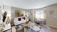 Located at 3190 Skinner Mill Rd in Augusta, Georgia, this two-floor residence offers a well-organized layout with contemporary finishes throughout. The living room is a welcoming focal point, featuring wood-style flooring, a textured ceiling, and large windows with blinds that invite natural light. Bold, colorful artwork and a neutral color palette give the space a modern, curated feel.

The kitchen is outfitted with white shaker-style cabinetry, granite countertops, stainless steel appliances including a refrigerator, range, microwave, and dishwasher, and wood-style flooring—providing both functionality and style. The dining area stands out with a rich burgundy accent wall, wood-style flooring, and French doors that open to the outdoors, creating a bright and inviting atmosphere.

The bedrooms feature plush carpet, ceiling fans, and generous windows with ample natural light. Accent walls in deep burgundy and charcoal gray add character, while each room offers a comfortable and private retreat. The bathrooms include granite-topped vanities with white cabinetry and marble-style tiled tub and shower surrounds, delivering a clean and polished finish. A convenient half bath is also present. Throughout, the design balances modern updates with comfortable, livable spaces.