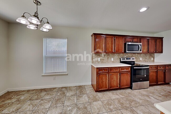 Foto del edificio - 26949 Carriage Manor Ln