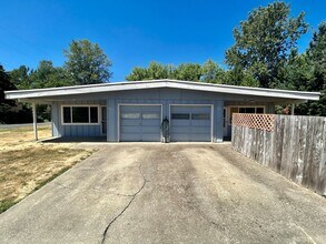 Building Photo - 201-203 SE Bridgeway Ave