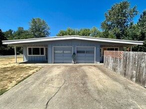 Building Photo - 201-203 SE Bridgeway Ave