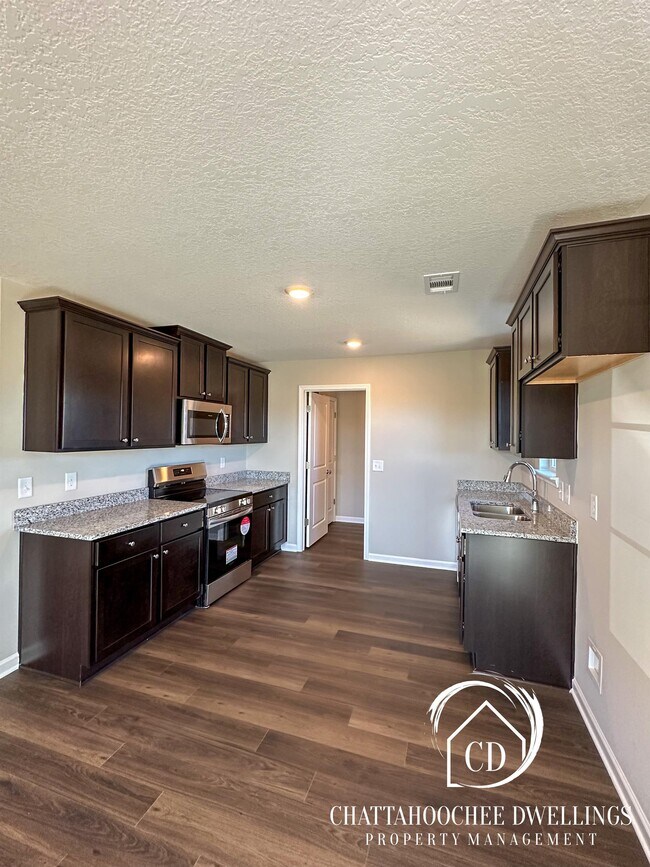 Building Photo - 6379 Sandy Bottom Dr