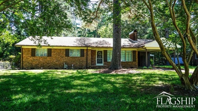 Building Photo - Cute Brick Ranch With Sunroom  Carport