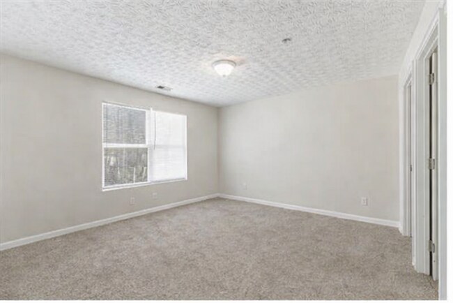 Foto del edificio - Spacious 2nd Floor Condo in Lithonia, Georgia -- Vouchers Accepted