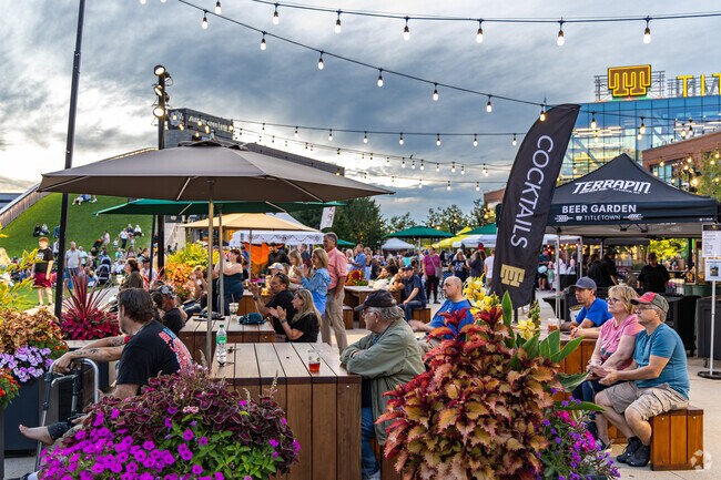 People from all around come to the Titletown Night Market for summer fun.