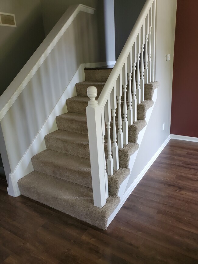Stairs up to the main bedrooms - 8627 N Chatham Ave
