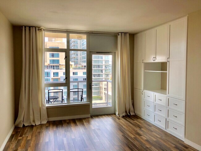 Bright Living Area with custom media center/storage - 427 9th Ave