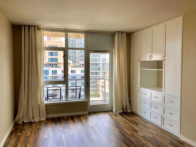 Bright Living Area with custom media center/storage - 427 9th Ave