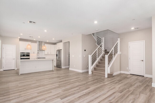 Building Photo - Charming 2 story townhome with 2 car garag...
