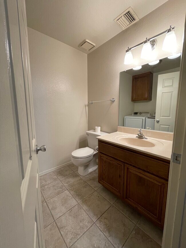 Half bath and washer/dryer room - 424 W Avenue J5