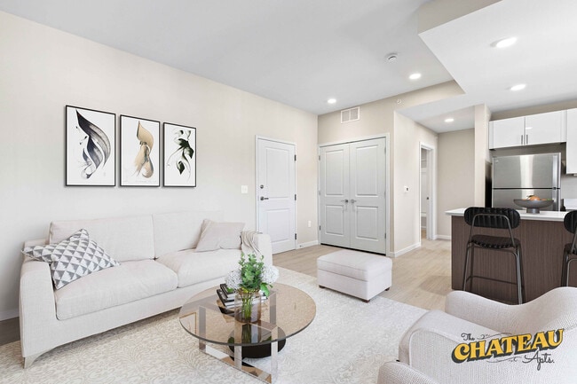One Bedroom Living Room - Chateau Apartments