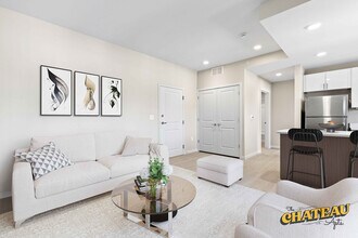 One Bedroom Living Room - Chateau Apartments