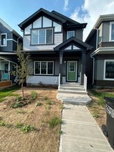 Building Photo - 704 Orchards Blvd SW