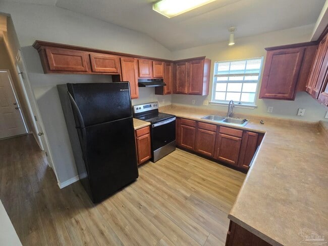 Foto del edificio - 3115 Flintlock Dr