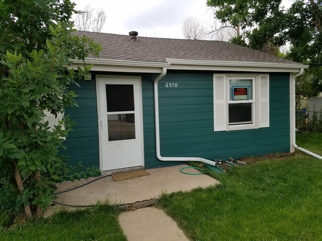 Building Photo - 6570 E 60th Ave