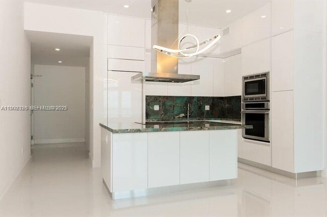 Building Photo - 6799 Collins Ave