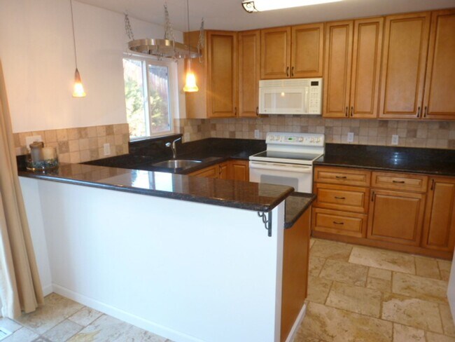 Building Photo - Four Bedroom, Two Bath, Two Car Garage Rem...