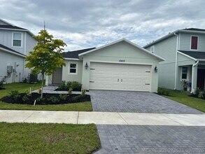 Building Photo - 10818 NW Moon Rise Ln