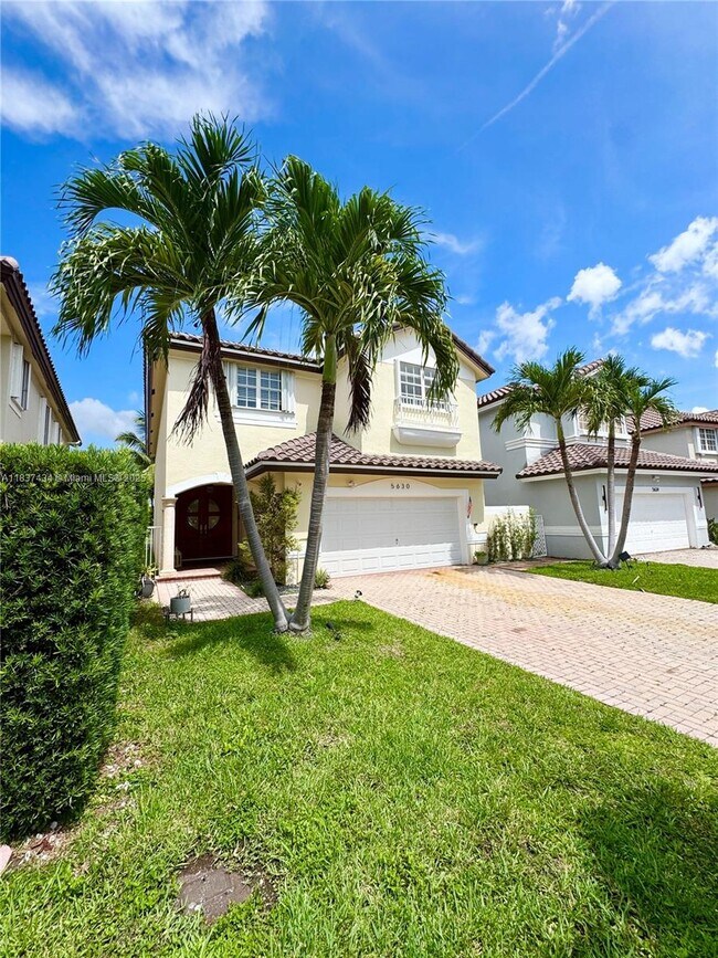 Building Photo - 5630 NW 104th Ct