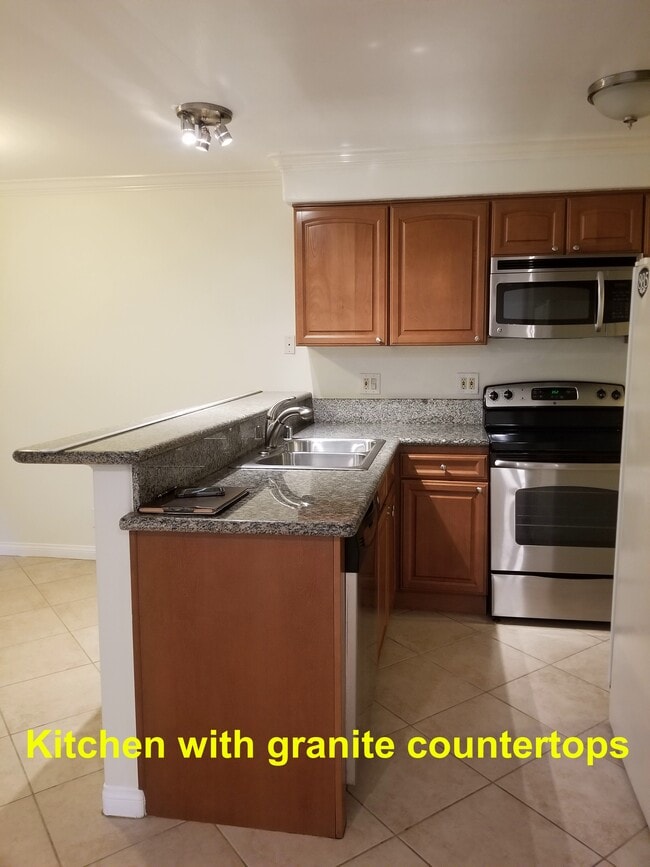 Kitchen with granite countertops - 4100 Patrice Rd
