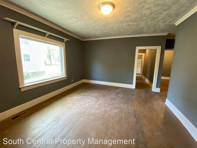 Building Photo - 3 br, 1 bath House - 205 W. 14th Ave.