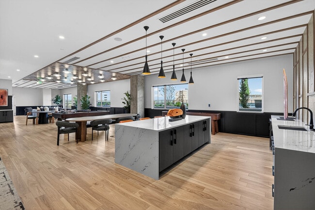 Clubroom with shuffleboard - AMLI Golden Triangle