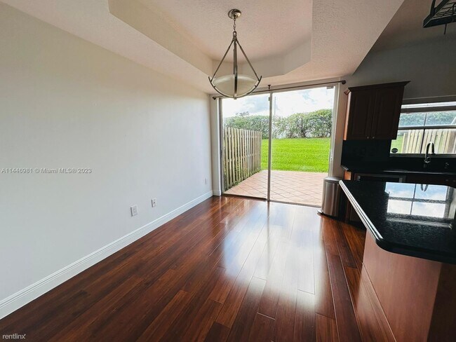 Foto del edificio - 2 br, 2.5 bath House - 6120 NW 116th Pl Ap...