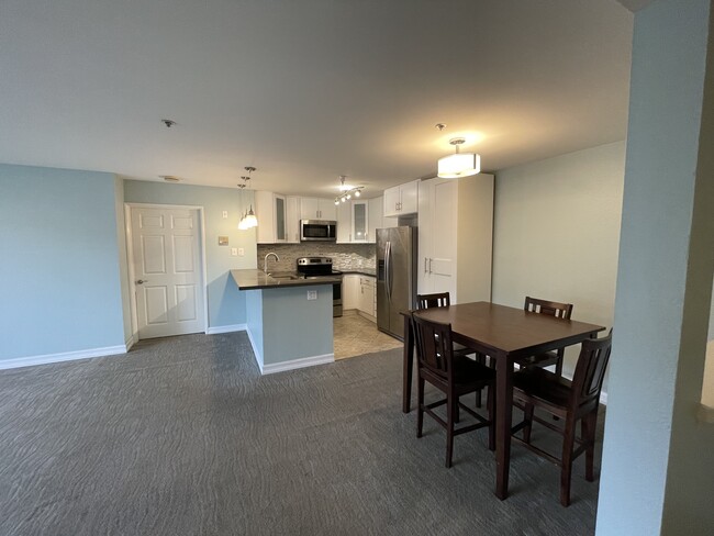 Kitchen and living room, from entry (table just for perspective) - 5665 Friars Rd