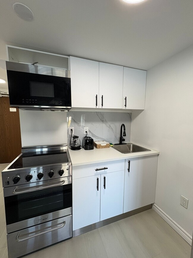 Building Photo - Riverflow Residences