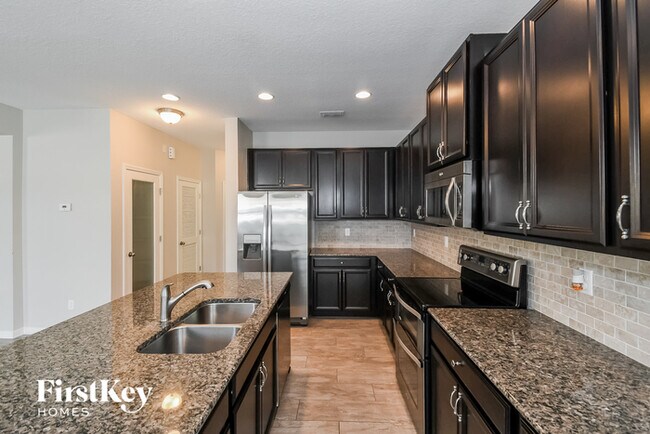 Building Photo - 7031 Azalea Grove Dr