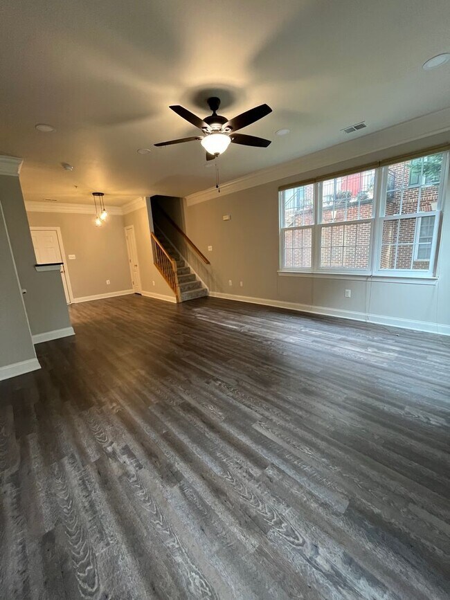 Building Photo - LUXURY 2 LEVEL END UNIT CONDO WITH WOOD FL...
