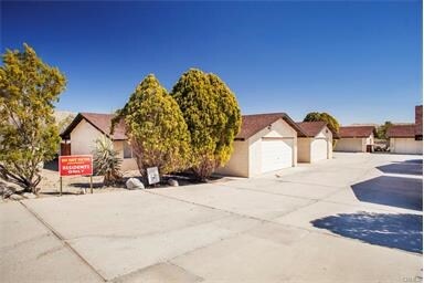 Six homes in beautiful condition - 11081-11097 Cholla Ave