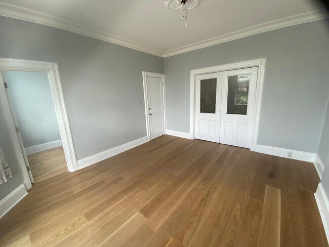 Living Room with Stainglass Slider to Kitchen - 2003 Summit Ave