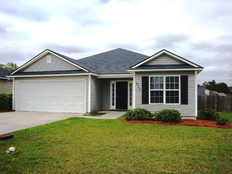 Primary Photo - Charming 3BR/2BA Home with Fenced Yard, Ga...