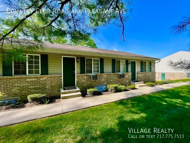 Building Photo - Roomy 2-bed w/ on-site laundry & playgroun...