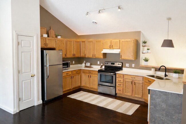 Unlimited kitchen storage and new quartz countertops. - 1102 Bergmann Dr