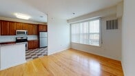 Located at 675 Tea Street in Bound Brook, NJ, this single-floor, 2-bedroom, 2-bathroom residence offers a well-designed layout with a clean, neutral palette throughout. The open living area features warm hardwood flooring and a large picture window that floods the space with natural light. Adjacent to the living area, the dining space is accented by a classic chandelier, adding an elegant touch.

The kitchen is a standout, equipped with rich wood cabinetry, granite countertops, a white tile backsplash, and a full suite of stainless steel appliances including a gas range, microwave, dishwasher, and refrigerator. A checkered tile floor adds visual character to the kitchen area.

Both bedrooms offer plush carpeting and multiple windows with views of surrounding greenery, providing a calm, natural ambiance. The primary bedroom includes a walk-in closet and ample space for furnishings.

The two bathrooms are well-appointed: one features a soaking tub framed by warm beige tile and a window overlooking lush outdoor greenery, while the second includes a tub/shower combo with tile surround, a wood vanity with a white countertop, and a large mirror. Together, the rooms create a comfortable, functional living environment.