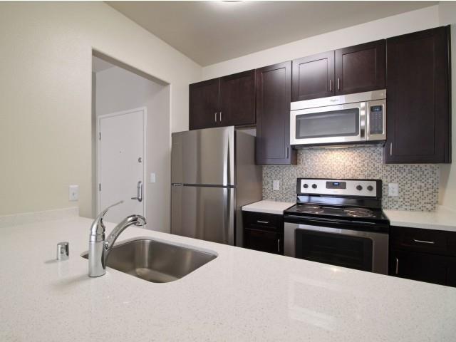 Allegro At Jack London Square Apartments Oakland Ca Sleek Modern Kitchens Feature Quartz Counters And Stainless Steel Liances Allegro At Jack London