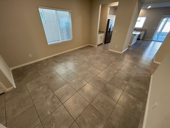 Building Photo - Gorgeous two-story home with 5 bedrooms and 3 bathrooms in a gated community