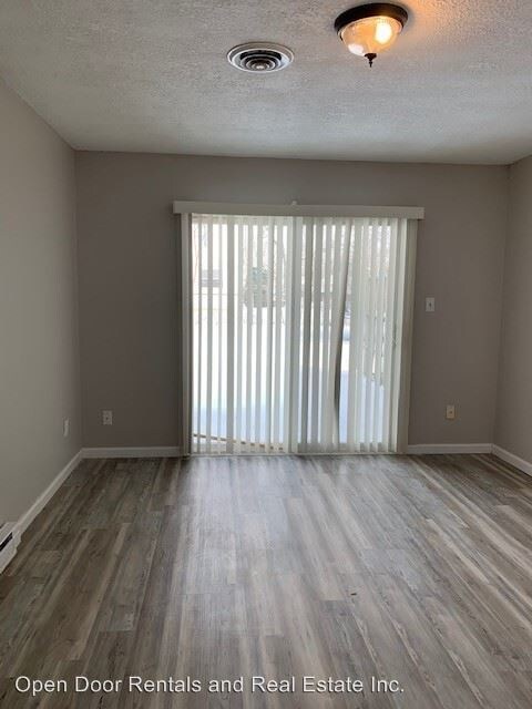 Building Photo - 7123-7125 Selkirk Dr