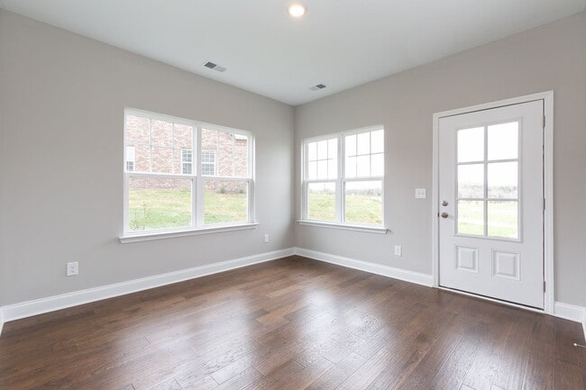 Building Photo - **BE THE LUCKY ONE TO LIVE IN THIS 2022-BUILT UPSCALE COTTAGE HOME IN THE PRESERVE AT BELLE POINTE**