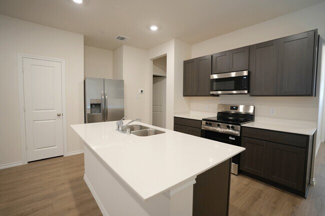 Building Photo - 7005 Cottonseed Dr