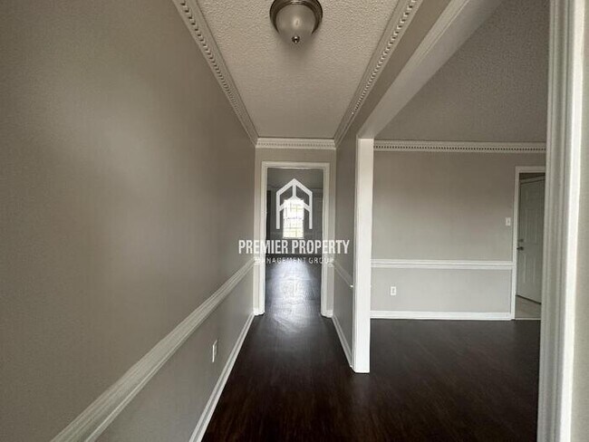 Building Photo - 8280 Chimneyrock - Coming Soon!