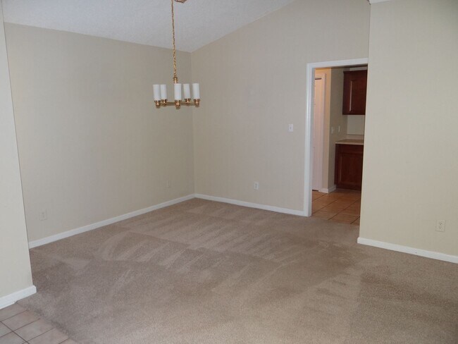 Building Photo - Lovely 3 bedroom 2 bath home in 55 and older neighborhood with 2 car garage