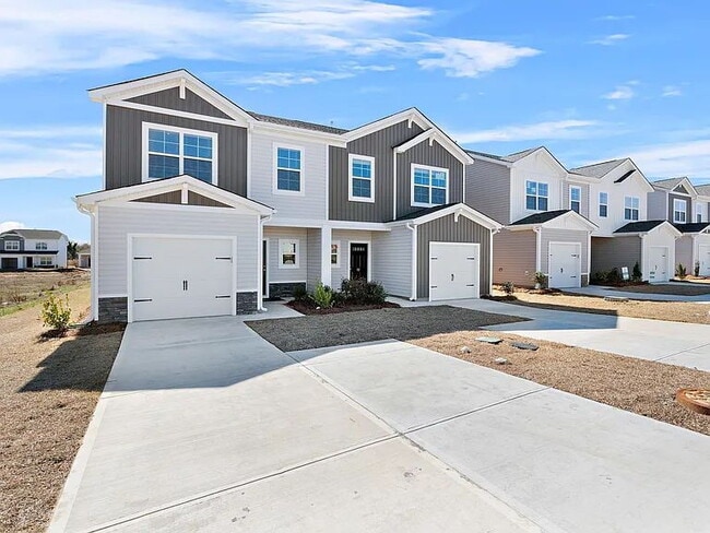 Building Photo - Now Available! New Construction!