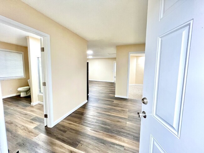 Building Photo - Elevated 3-Bedroom Home with Secure Garage & Cozy Living Space