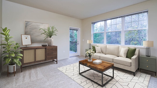 Carpeted Living Room with Balcony - The Reserve at Town Center